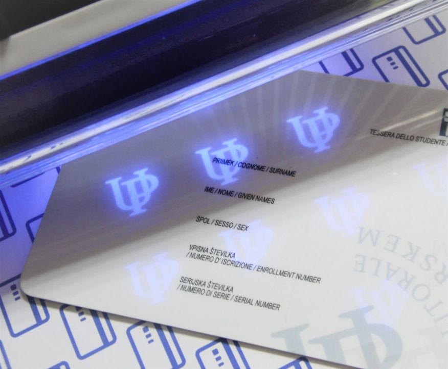 Card with the logo visible in UV light