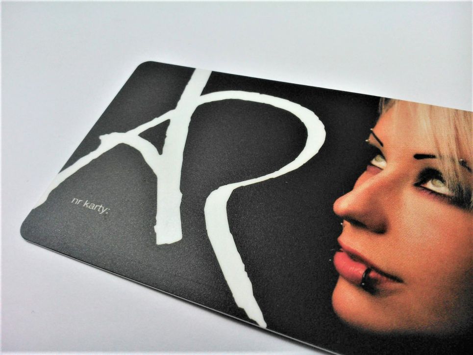 Plastic business card with coarse matte lamination