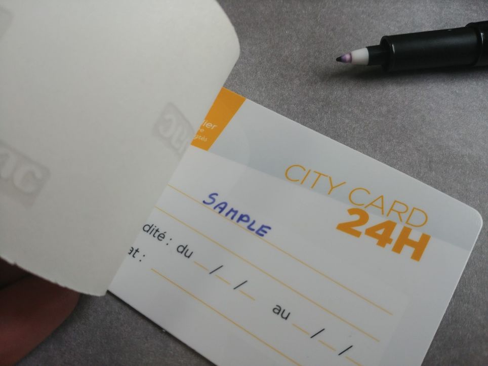 Plastic city ticket with sticker